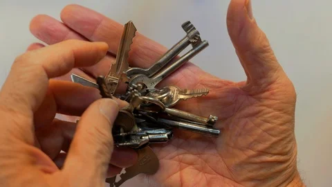 Bunch of keys in a hand 스톡 동영상 102903589