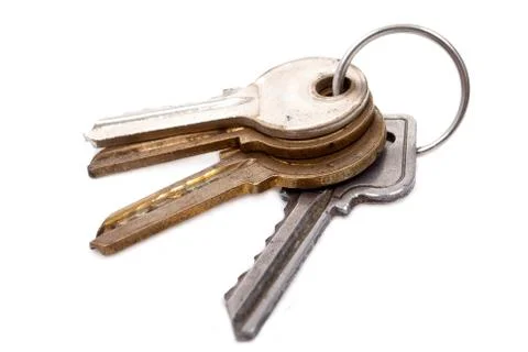 Bunch of keys on white background Stock Photos