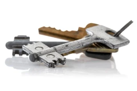 Bunch of keys on white Stock Photos