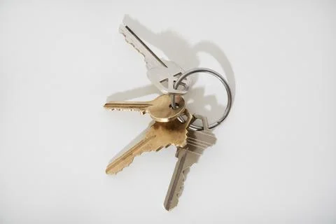 Bunch of keys on white Stock Photos