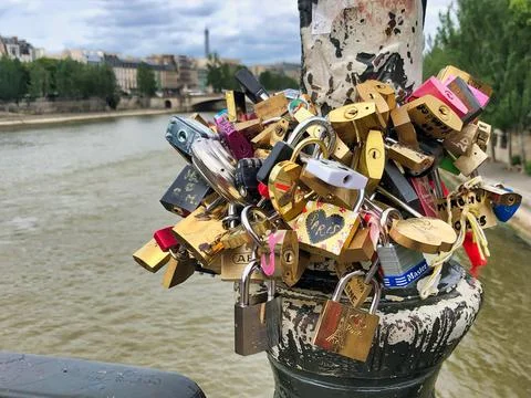 Bunch of love locks on a light pole in Paris, France Stock Photos
