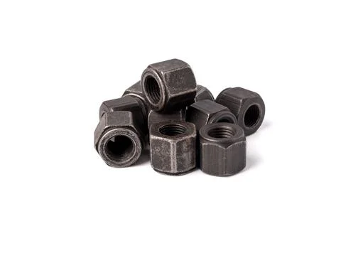 Bunch of metallic nuts isolated on white background. Female screw nut with copy Stock Photos