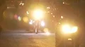 Bunch of motorbiker friends slowly driving dark street with bright headlights 4k or 4k+ Resolution