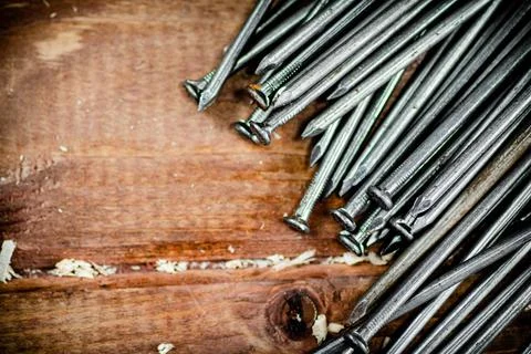 A bunch of nails on the table. Stock Photos