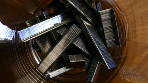 A bunch of office staples. Some metallic paperclips Stock Footage 149841840