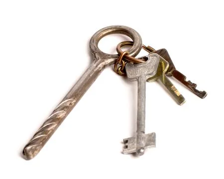 Bunch of old keys on white Stock Photos