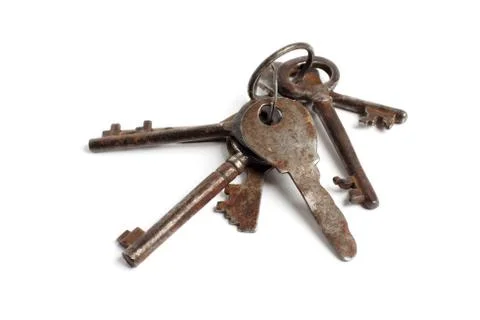 Bunch of old keys on white Stock Photos