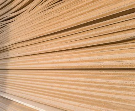 A bunch of old MDF of poor quality. Stock Photos