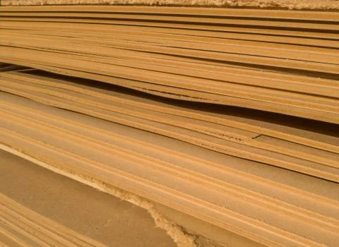 A bunch of old MDF of poor quality. 스톡 사진