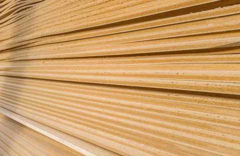 A bunch of old MDF of poor quality. Stock Photos