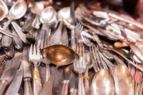 Bunch of old silver ware on a flea market Stock Photos