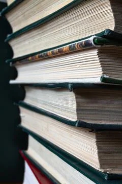 A bunch of old thick books Stock Photos