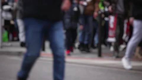 A bunch of people are walking down the street Stock Footage 269830006
