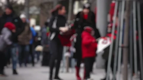 A bunch of people are walking down the street, people are walking down the stree Stock Footage 269830543