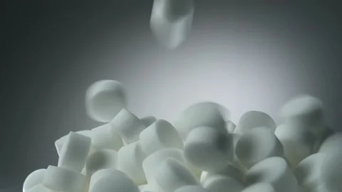 A bunch of pills slow falling on a white background Stock Footage 148916169