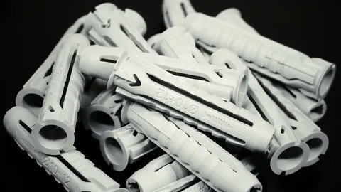 Bunch of plastic dowels (on a rotating plate) Stock Footage 69104278