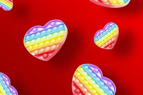 Bunch of rainbow-colored pop-it toys floating on a red background Stock Photos