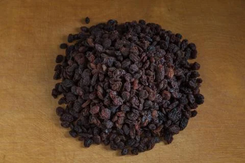 A bunch of raisins on the table. Stock Photos