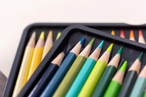 Bunch of random colored pencils, close up macro. White background Stock Photos