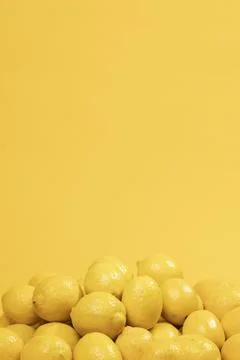 Bunch raw lemons with copy space Stock Photos