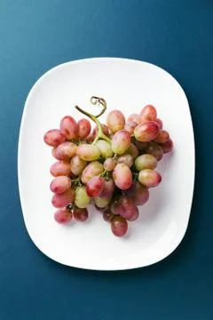 Bunch of red grape. Stock Photos