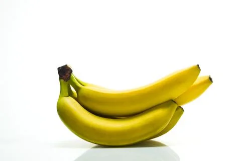 Bunch of ripe bananas on a white background Stock Photos