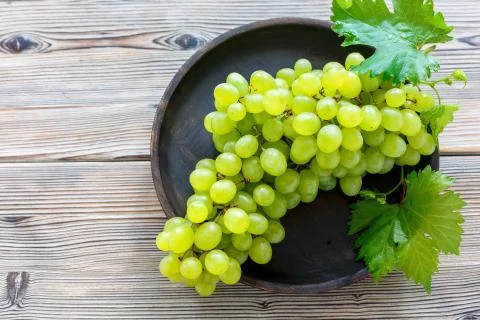 Bunch of ripe white grapes. Stock Photos