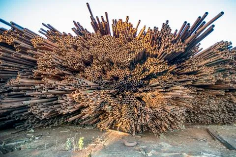 Bunch of rust pipes is made one by one Stock Photos