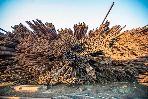 Bunch of rust pipes is made one by one Stock Photos