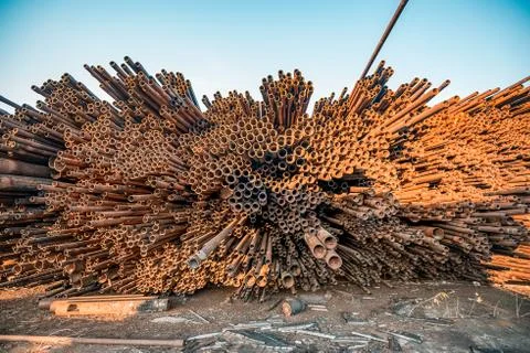 Bunch of rust pipes is made one by one Stock Photos