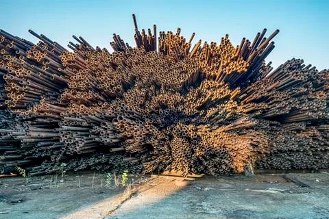 Bunch of rust pipes is made one by one Stock Photos
