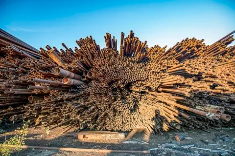 Bunch of rust pipes is made one by one Stock Photos