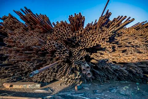 Bunch of rust pipes is made one by one Stock Photos