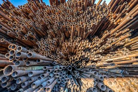 Bunch of rust pipes is made one by one Stock Photos