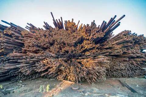 Bunch of rust pipes is made one by one Stock Photos