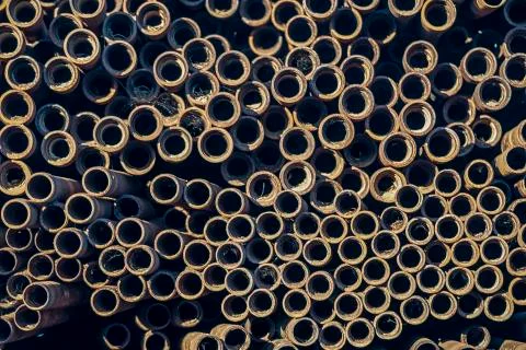 Bunch of rusty radioactive tubes are drawn close together Stock Photos