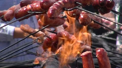 Bunch of sausages on fire Stock Footage 67629007