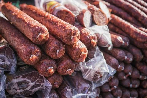 Bunch of sausages on a stall Stock Photos