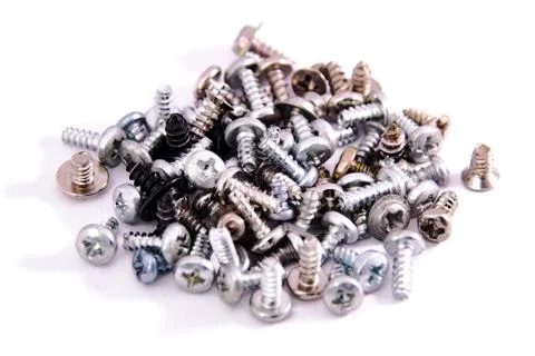 Bunch of screws macro closeup on white background isolated Stock Photos