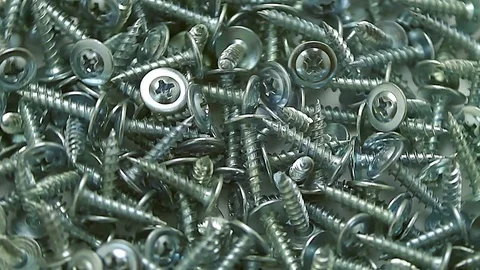 Bunch of screws rotating Stock Footage 73717198
