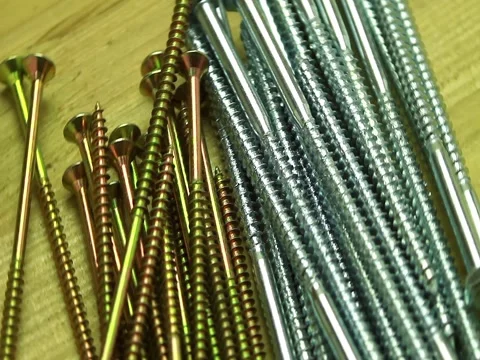 Bunch of screws rotating Stock Footage 73718608