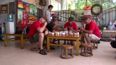 Bunch of sightseers are discovering native delicacies of China at establishment. Stock Footage 234118337