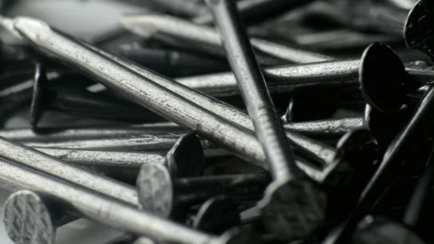 A bunch of small construction nails. macro photography. Slow motion close-up Stock Footage 228120806