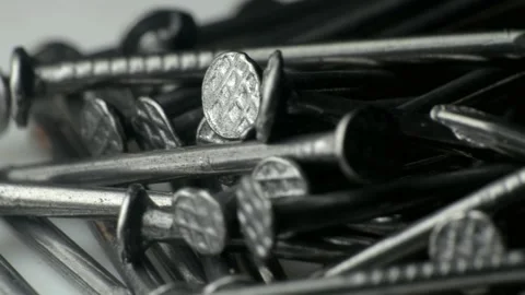 A bunch of small construction nails. macro photography. Slow motion close-up Stock Footage 228120814