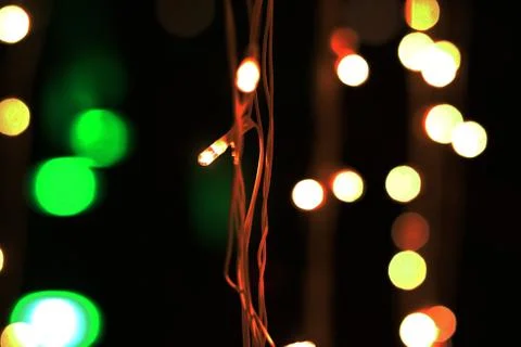 Bunch of small lights hanging on string Stock Photos