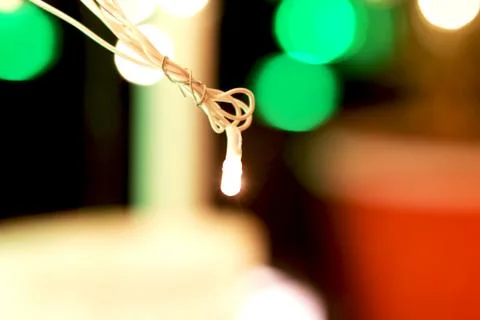 Bunch of small lights hanging on string Stock Photos