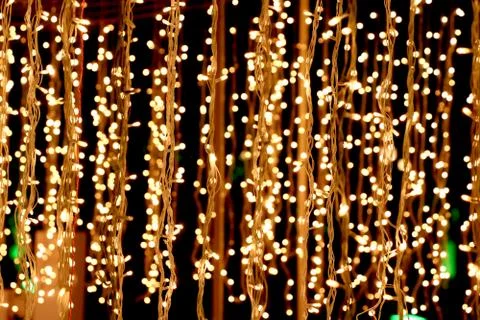 Bunch of small lights hanging on string Stock Photos