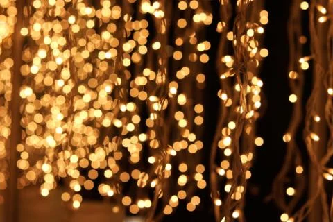 Bunch of small lights hanging on string Stock Photos