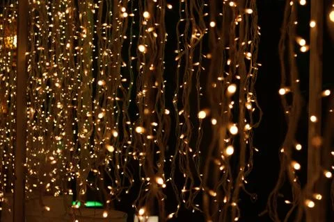 Bunch of small lights hanging on string Stock Photos