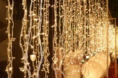 Bunch of small lights hanging on string Stock Photos